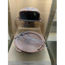 Ancient Greek ceramic brazier and cooking pan with spits